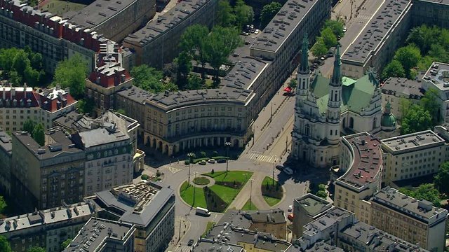 Aerial establishing shot of Zbawiciela Square historic landmark in Warsaw, Poland
