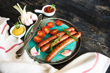 Grilled sausages with rosemary