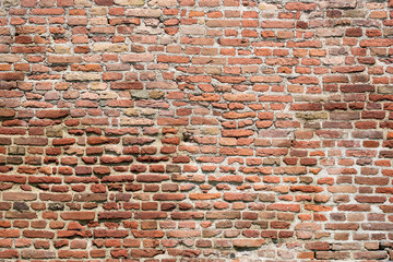 Naklejka premium Old red brick wall texture background