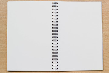 opened spiral blank notebook