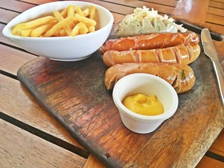 Sausage plate / Variety of sausages serve in wooden plate