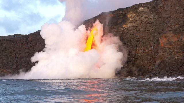 Lava from the Kīlauea volcano flows into the ocean on the Big Island of Hawaii