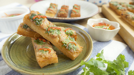 Bread fried with minced pork spread Thai food