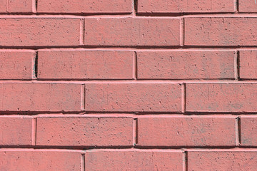 Obraz premium Pale pink painted brick wall