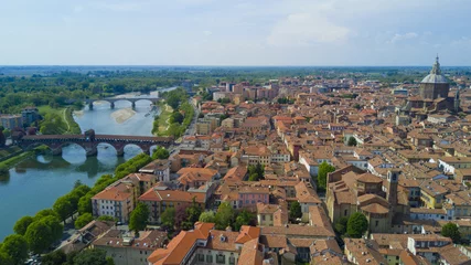 Foto op Canvas Aerial video shooting with drone on Pavia, famous Lombardia city near the Ticino river in northern Italy © immaginario75