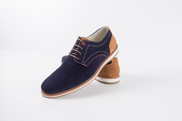 Male Blue Shoe on White Background, Isolated Product, Top View, Studio.