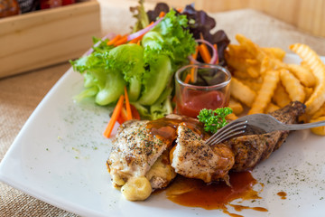 Grilled pork chop  with cheese