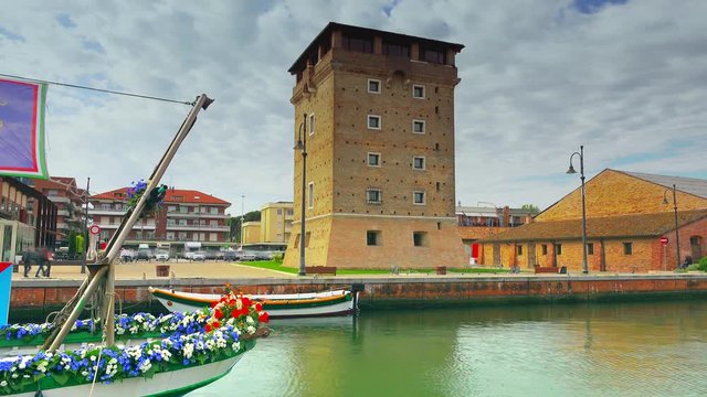 timelapse of tower on harbor channel