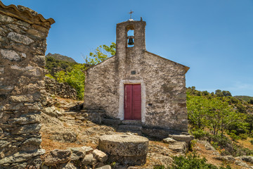 Fototapeta na wymiar Old chapel in abandoned village of Casenove in Corsica