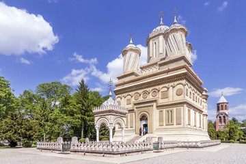 Fototapeta na wymiar Beautiful view of the Curtea de Arges Monastery and Cathedral on a sunny day, Romania