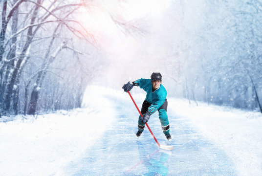 Ice hockey player in uniform on frozen walkway