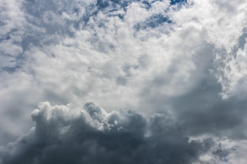 White fluffy clouds in the blue sky