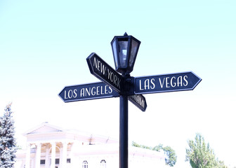 Street sign arrow on nature background