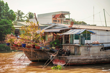 Can Tho, Vietnam - November 15, 2014: Unidentified people on floating market in Mekong river delta. Cai Rang and Cai Be markets are very popular among the local citizens and tourists.