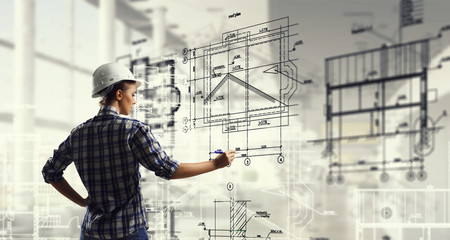 Engineer woman draw layout