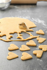 Preparing of butter cookies on table