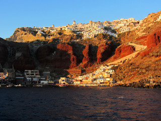 View of Ammoudi and Oia, Santorini at sunset, Greece