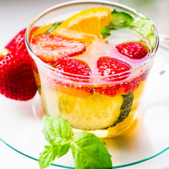 Drink. Pimms in tea cup, white background