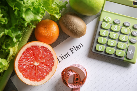 Diet plan and healthy foods on light background