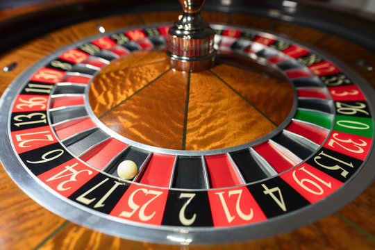 American Roulette wheel with a ball in the number '17'
