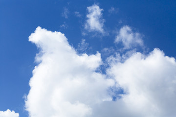 white clouds against blue sky