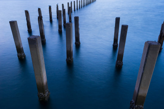 Abstract abandon sea port claim scean in blue ocean