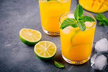 Fresh summer mango cocktail with lime and mint
