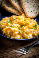 Scrambled eggs with onion and chives.