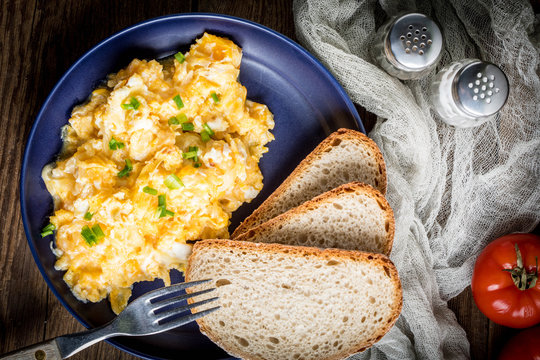 Scrambled eggs with onion and chives.