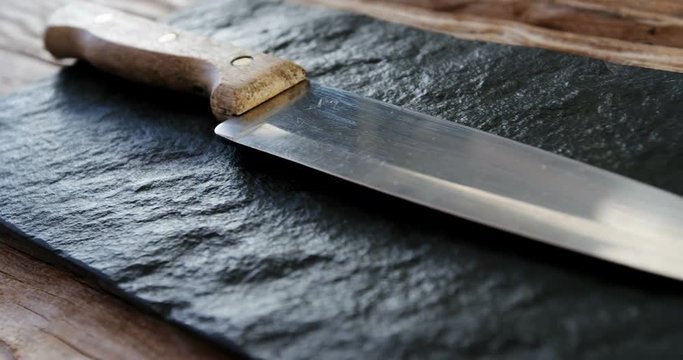 kitchen knife on stone board