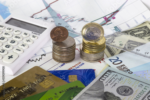 Heap On Quarter Dollars With One Cent Top Of Euro Coins Heap On Quarter Dollars With One Cent Top Of Euro Coins