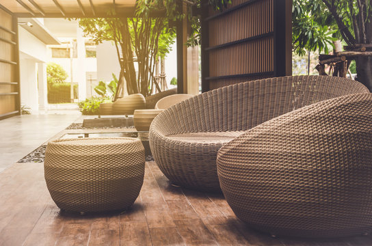 outdoor furniture rattan armchairs and table on terrace