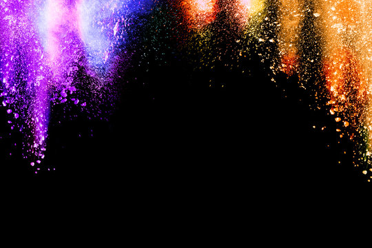color powder explosion on black background.