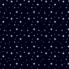 Celestial seamless background with multiple sparkling stars glittering on dark blue sky in the night. 