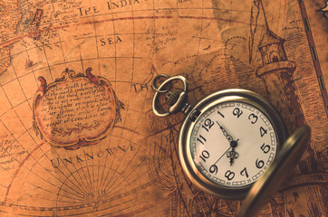 pocket watch  or pendant watch on vintage map background (watch)