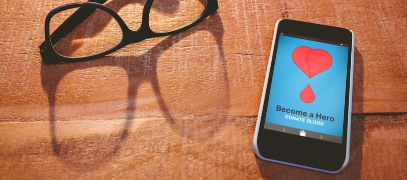 Composite image of become a hero text with heart shape on screen - Powered by Adobe