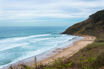 Idyllic beach in La isla, Asturias on a day in spring in Spain