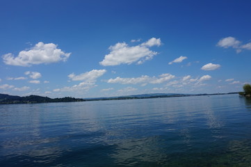 Fototapeta na wymiar Wolken über dem See