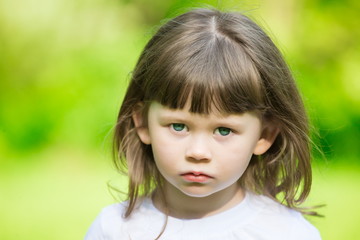 girl face, sad blue eyes, close up