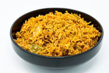 Homemade Chinese fried rice with vegetables and fried eggs
