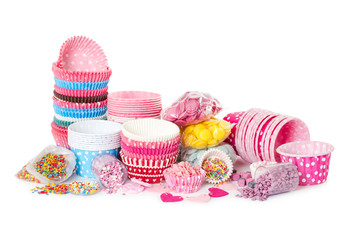 Paper cups for cupcake and colorful sprinkling for decorating