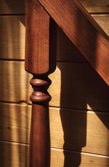 Wooden balusters on the stairs of country house