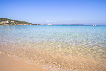 Fototapeta na wymiar The beach at Baja Sardinia in Sardinia, italy