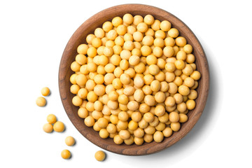 uncooked soybeans on white, top view