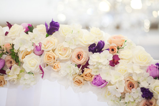 flower arch from fresh colors for a wedding ceremony closeup. wedding decor concept.