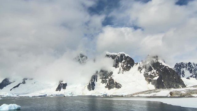 Time lapse clouds over mountains in Antarctica