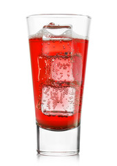 Glass of tropical red lemonade with ice cubes