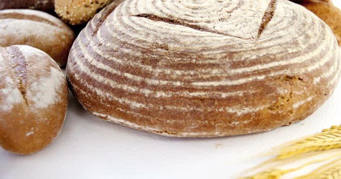 Various types of breads with wheat grains