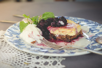 Blueberry cake with blueberry sauce. homemade blueberry cake with whipped cream