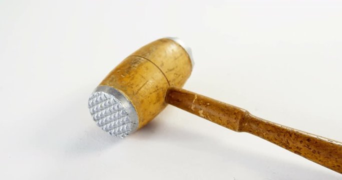 Close-up of meat tenderizer wooden hammer